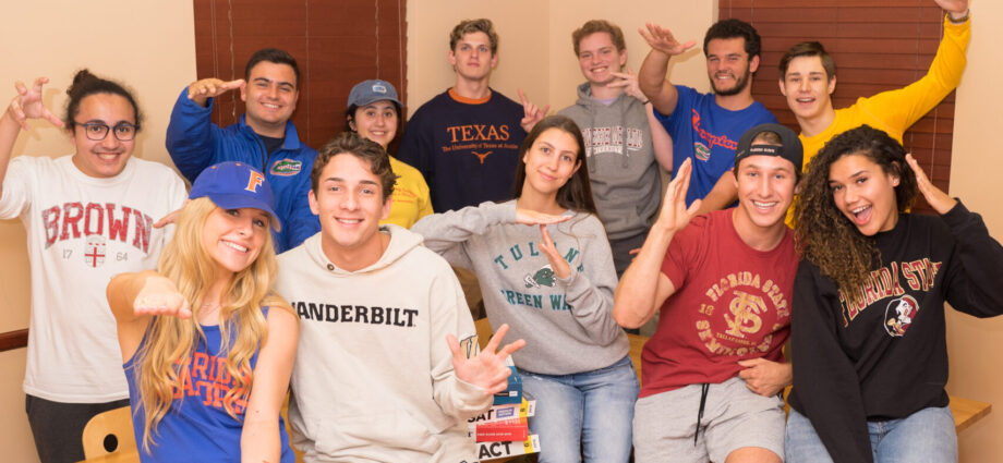 students wearing shirts from their favorite colleges